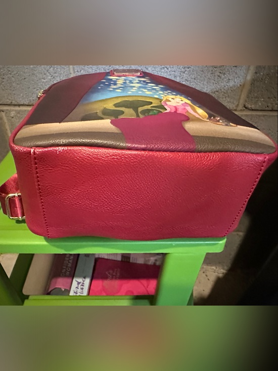 Loungefly Disney Rapunzel Lantern Backpack New with tags but small flaw see pics